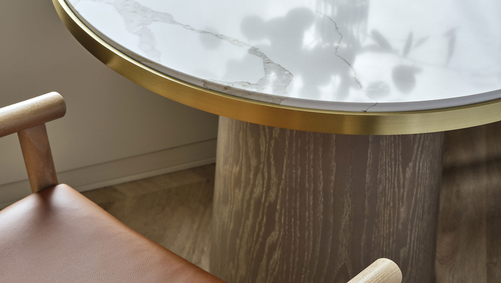 marble top with brown leather chair