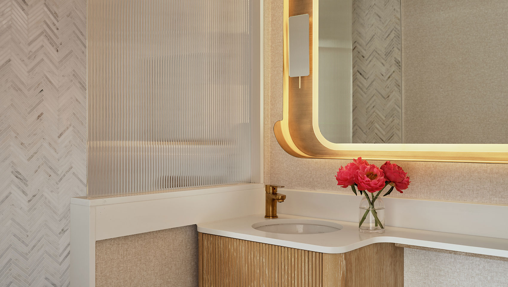 Bathroom sink and tub at Kimpton Ashbel Hotel