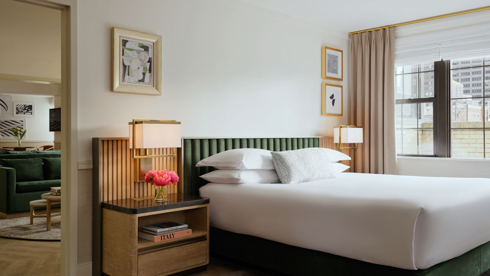 Suite Bedroom with side table at Kimpton Ashbel Hotel