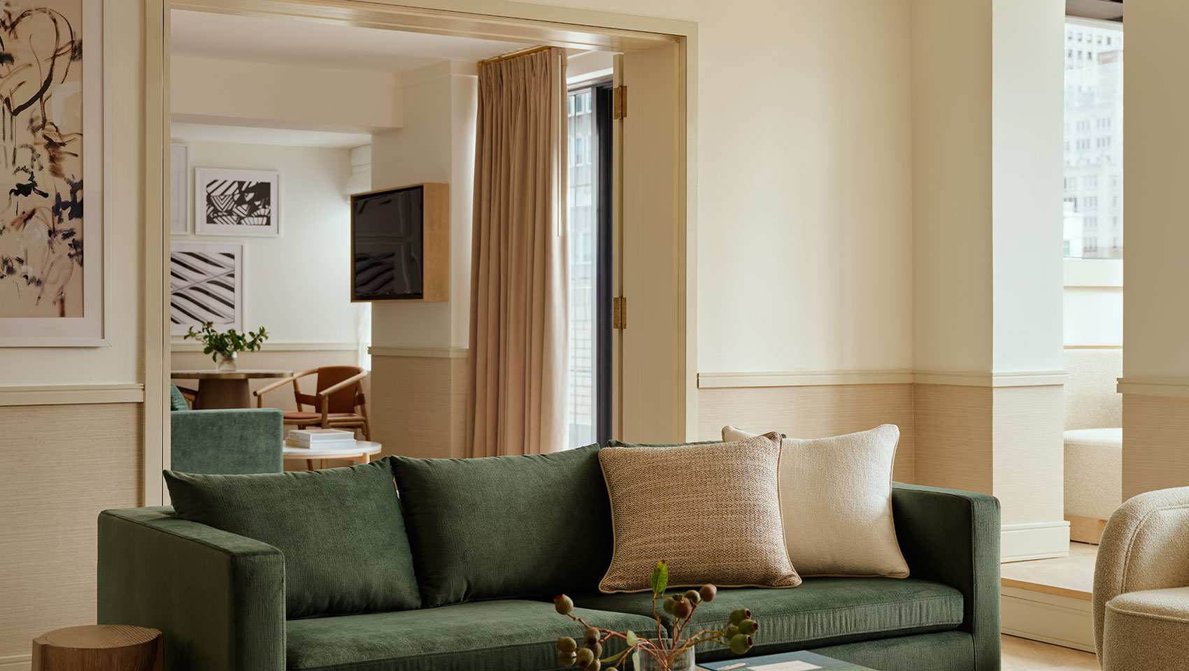 Penthouse Sitting Area at Kimpton Ashbel with view of bed