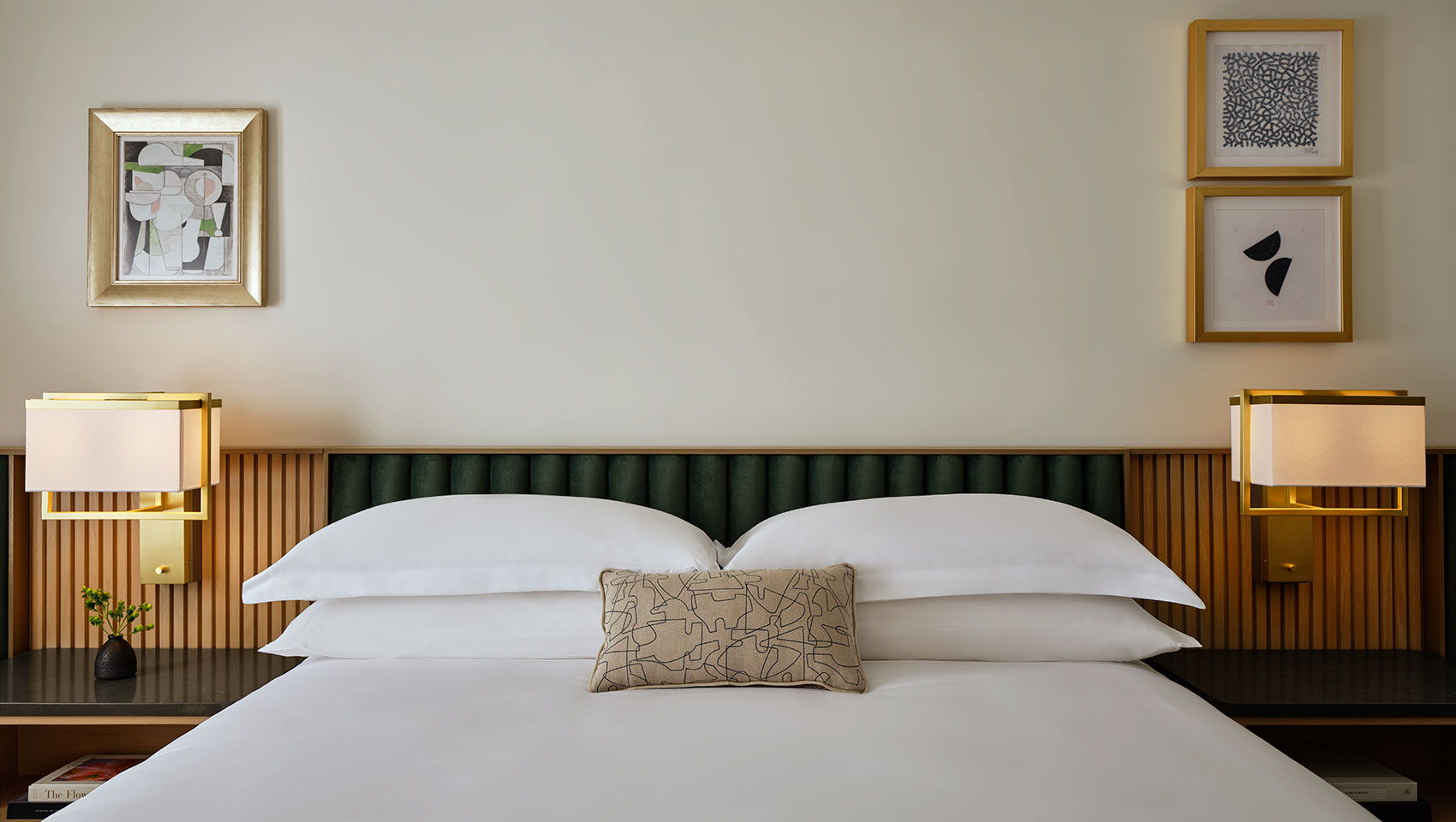 king guestroom with bedside tables and lamps at kimpton park ave hotel