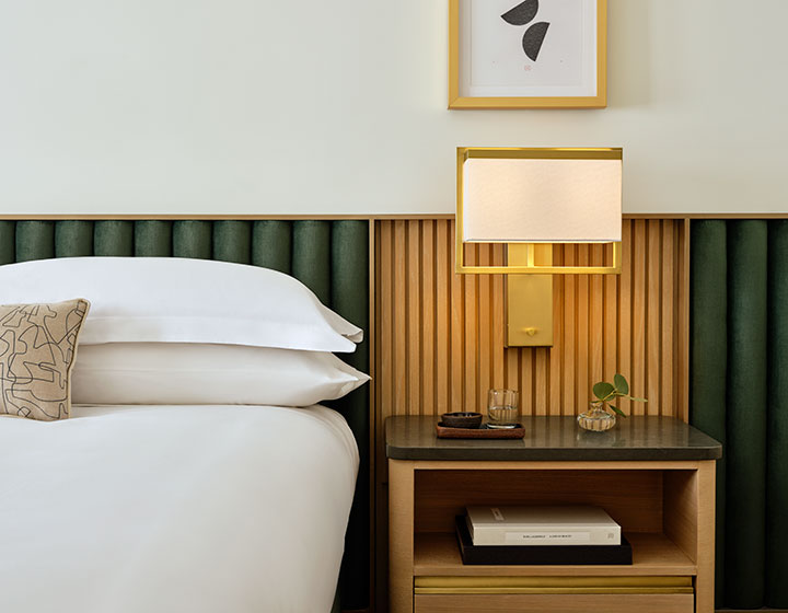 Kimpton hotel park ave guestroom bedside table and lamp